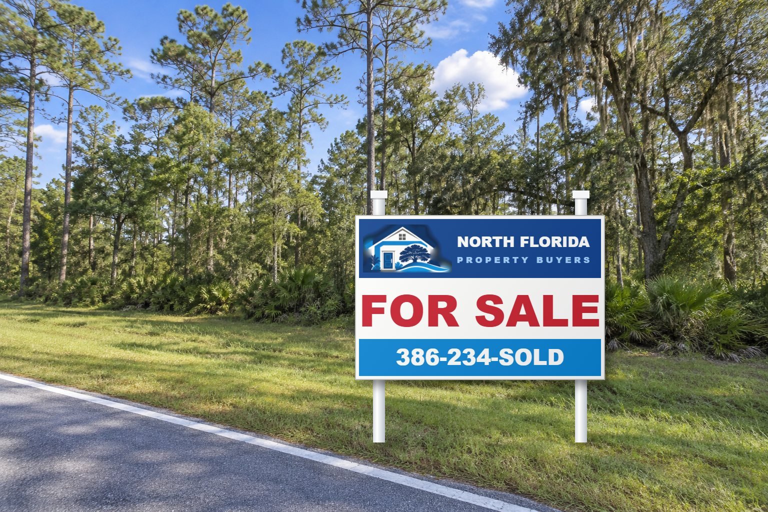 Wooded North Florida lot with a North Florida Property Buyers For Sale sign by the road